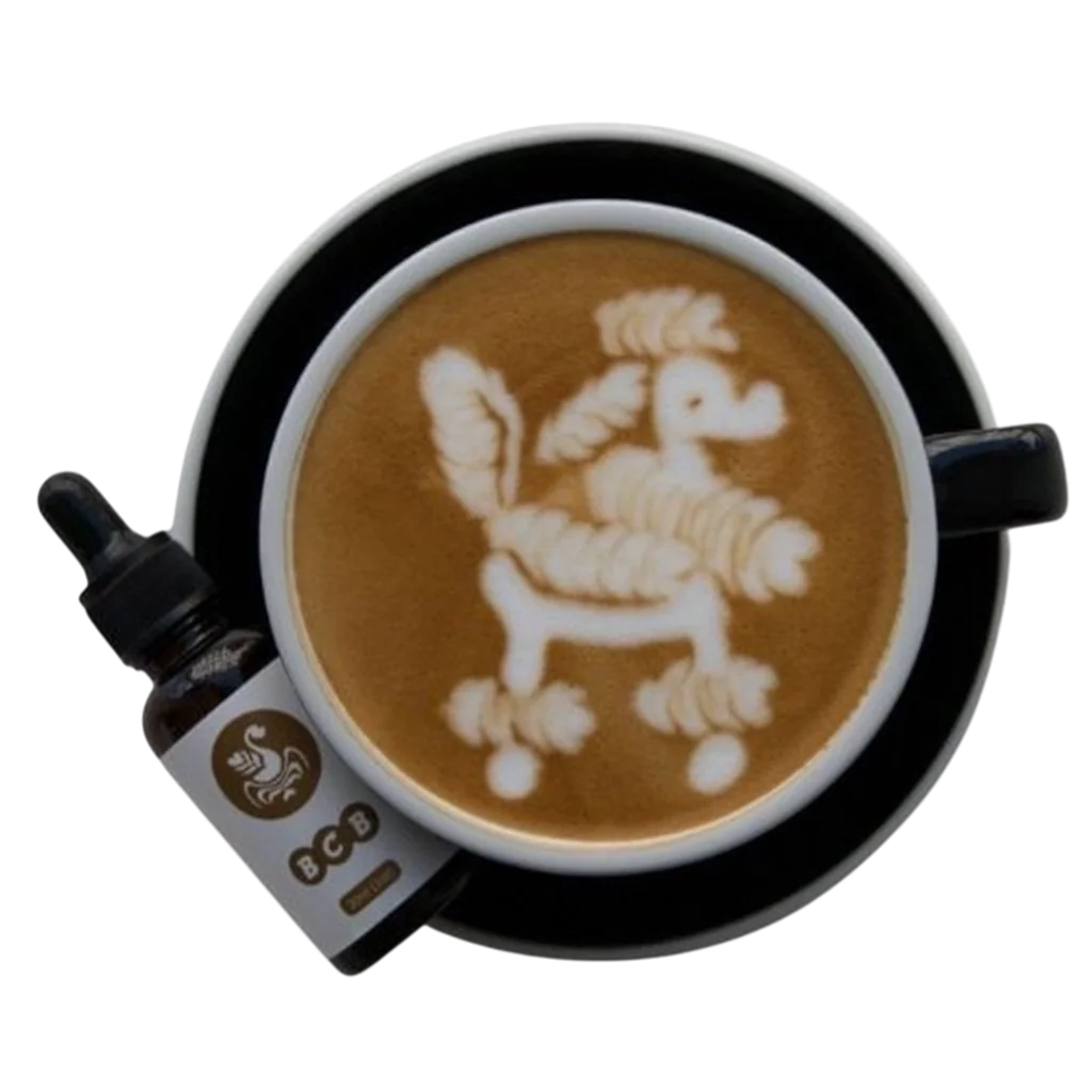 Tasse von oben mit Latte Art von einem Pudel, daneben die BCB Tropfen
